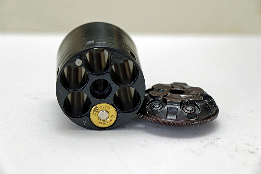 The conversion cylinder showing its rebated rim recesses. Because of this, 45 S&W cartridges would not fit as their rim is too large to enter the rim recesses.